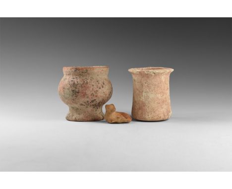 3rd-2nd millennium BC. A mixed group comprising: a limestone jar with tapering sidewall, everted rim; a ceramic jar with bulb