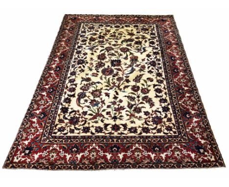 ISPHAHAN PART SILK CARPET, 220cm x 148cm, all over palmette and vine design on an ivory field within corresponding borders.