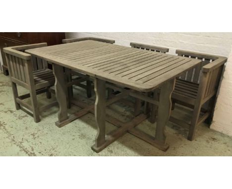 GARDEN TABLE AND CHAIRS, vintage weathered teak after a design by Heal &amp; Son London rectangular with six conforming chair