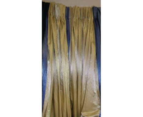 CURTAINS, a pair, in a gold fabric, blue edges, lined, gathered each 166cm W x 273cm Drop. (2)