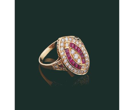 A ringGold 800/000Set with calibrated rubies, 35 8/8  and 3 brilliant cut diamonds totalling approximately 1,20 ct.Lisbon hal