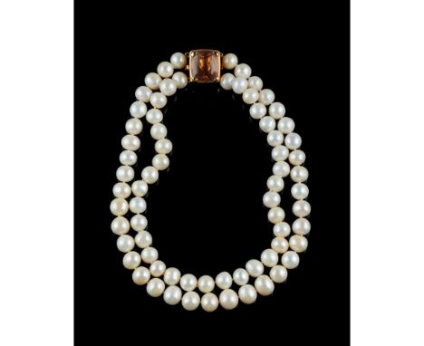 A pearl necklaceComprising of 2 fresh water pearls strandsGold clasp 750/000Set with morganitePost-2021 hallmark, signed Fior