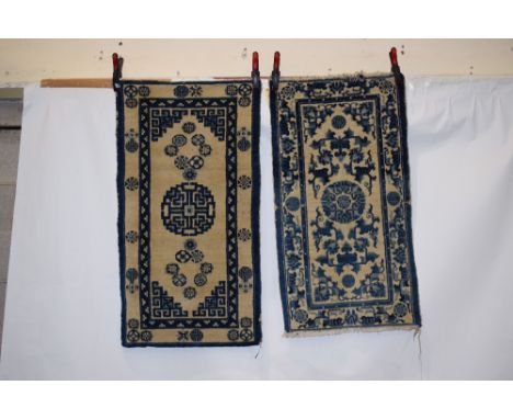 Two Baotou-Suiyuan rug, north west China, circa 1930s-40s, the first with ivory field 3ft. 8in. X 2ft. 2in. 1.12m. X 0.66m. S