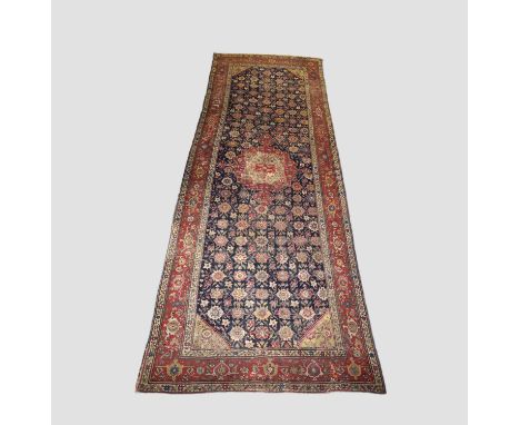 Attractive Karabakh kelleh, (reduced) south west Caucasus, early 19th century, 19ft. 6in. x 6ft. 9in. 5.95m. X 2.05m. Overall