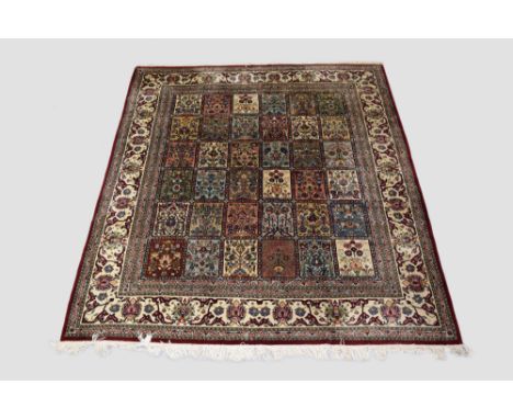 Tabriz 'garden' carpet, north west Persia, circa 1950s-60s, 9ft. 8in. X 8ft. 2in. 2.94m. X 2.49m. All over panelled design of