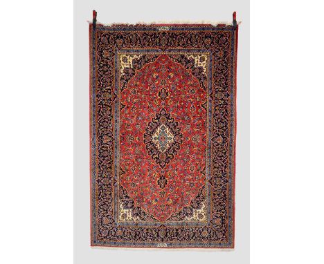 Kashan rug with inscription, west Persia, mid-20th century, 7ft. 2in. X 4ft. 9in. 2.18m. X 1.45m.  Leatherette strips to each