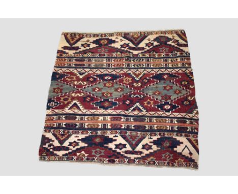 Two Anatolian kelims, the first a mafrash panel, circa 1930s-40s, 3ft. 1in. X 3ft.  0.94m. X 0.91m. Slight wear and corrosion