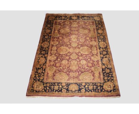 Agra carpet, north India, new production, 8ft. 11in. X 5ft. 11in. 2.72m. X 1.80m. Leatherette strips to selvedges verso. Ligh