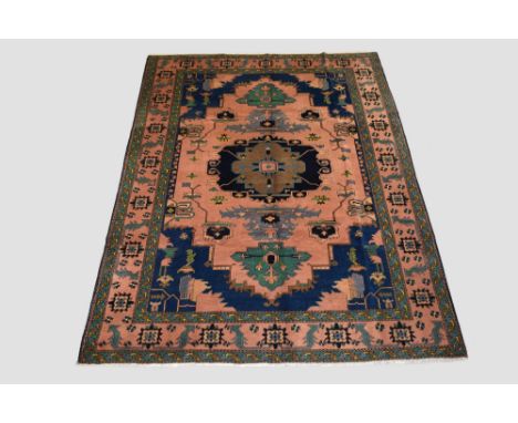 Heriz design carpet, Bamyan province, central Afghanistan,  circa 1980s-90s, 9ft. 9in. X 7ft. 1in. 2.97m. X 2.16m. Light pink