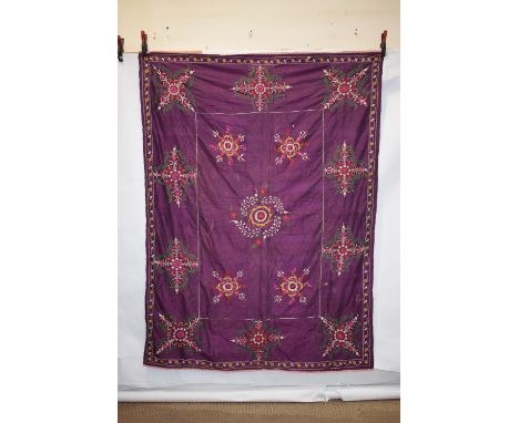 Group of five suzanis by the Uzbeks of Afghanistan, second half 20th century, comprising a long tent hanging, 135in. x 43in. 