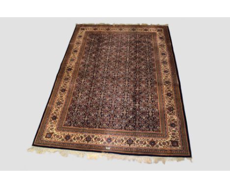 Indian carpet, Mirzapur area, north east India, last quarter 20th century, 11ft. 9in. X 8ft. 5in. 3.58m. X 2.56m. Slight wear