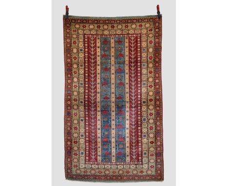 North Indian rug, Agra or Amritzar, circa 1930s-40s, 6ft. 10in. X 4ft. 1in. 2.08m. X 1.25m. The field composed of vertical ba