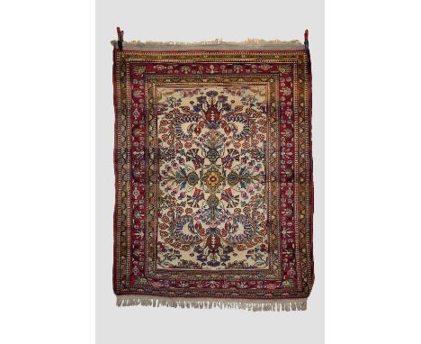 Esfahan rug, central Persia, circa 1930s, 6ft. 6in. x 5ft. 3in. 1.98m. x 1.60m. Very light surface marks.  Ivory field filled
