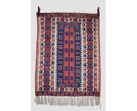 Two Anatolian rugs, the first: Konya kelim, central Anatolia, circa 1940s-50s, 4ft. 11in. X 3ft. 9in. 1.50m. X 1.14m. Central