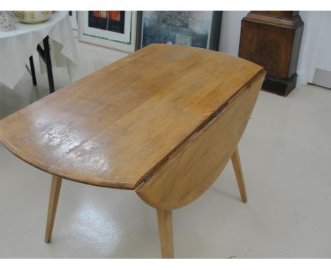 An Ercol drop-leaf 'pebble' table