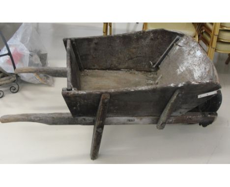 A vintage wooden wheelbarrow