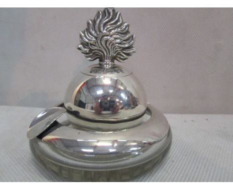 A HM silver Grenade lighter and silver-rimmed ashtray