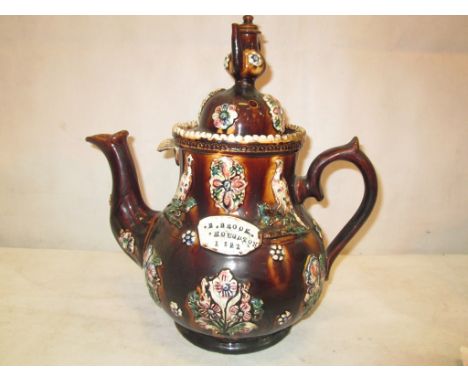 A Vicorian bargeware teapot inscribed 'R Brook, Houghton 1891'