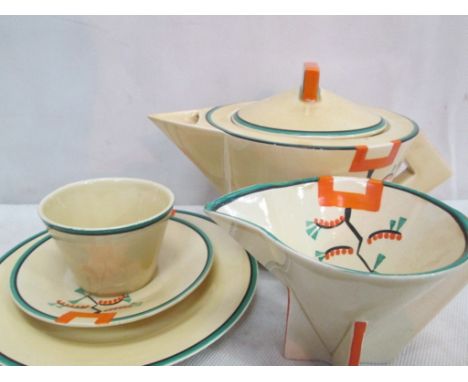 A Clarice Cliff teapot : 'Ravel' pattern; together with a milk jug and trio CONDITION REPORT: IN VERY GOOD CONDITION WITH NO 