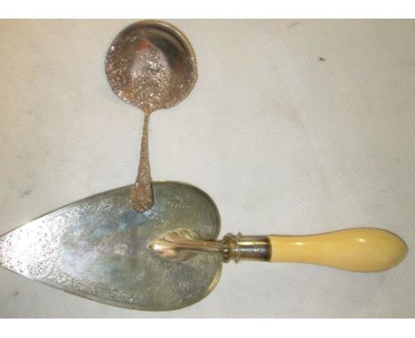 A silver trowel 'Gibbon Ltd, Belfast'; together with a sterling silver spoon