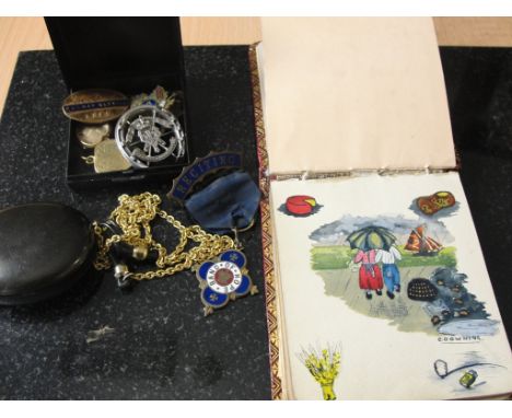 A Band of Hope medal; together with heart-shaped lockets, a Railway Service badge and an early 20th century sketch book