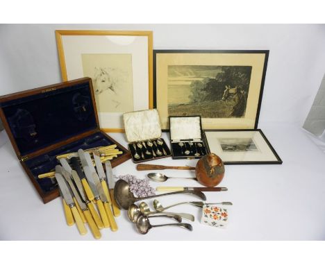 Miscellaneous items, including a silver table spoon, assorted flatware, a carved nut and three prints, including a Snaffles p