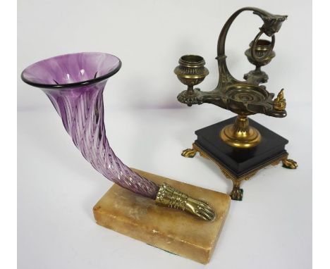 A late Recency ormolu and slate desk candelabrum, in the form of a classical oil lamp, with two candle sockets, the square sl