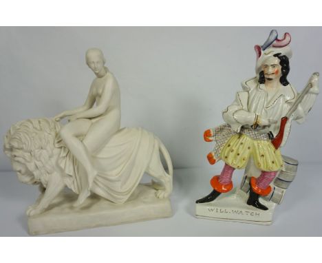 A Minton parian figure group of Una and the Lion modelled after the original by John Bell with the naked figure seated on the