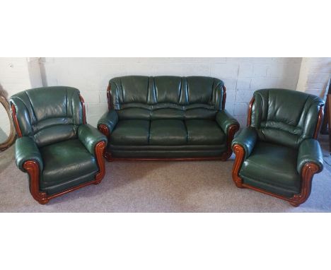 A modern three piece green leather suite, with fire labels, sofa, 177cm wide (3)