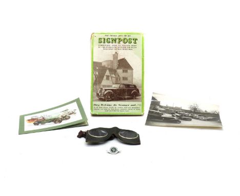 A collection of Bentley memorabilia,  motoring items comprising his driving goggles, his Bentley Driver's Club badge, a photo