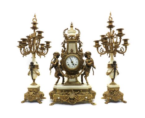 A gilt-metal and marble clock garniture, early 20th century, French, the white enamel dial set with Roman and Arabic numerals