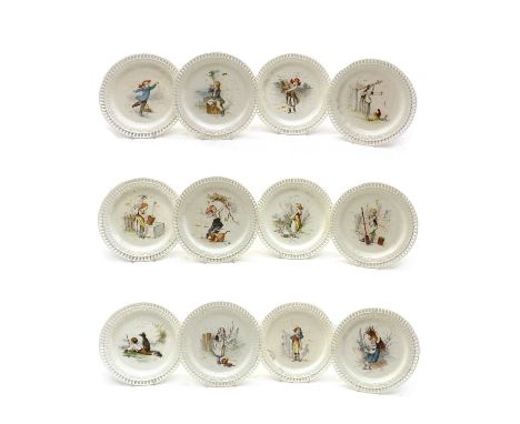 A cased set of twelve Minton creamware nursery plates,representing the months of the year, in an associated domed trunk,each 