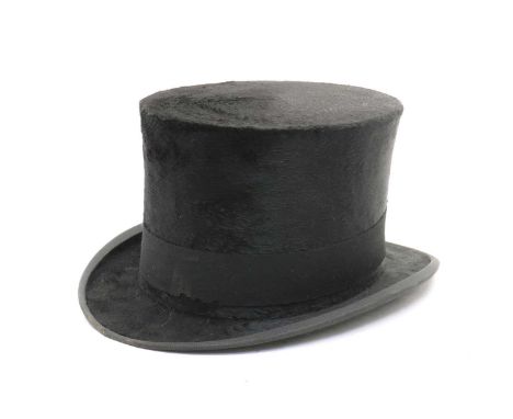 A collection of hats,comprising a Woodrow top hat, with a leather box, with impressed initials, 16.3cm internal width, 20.8cm