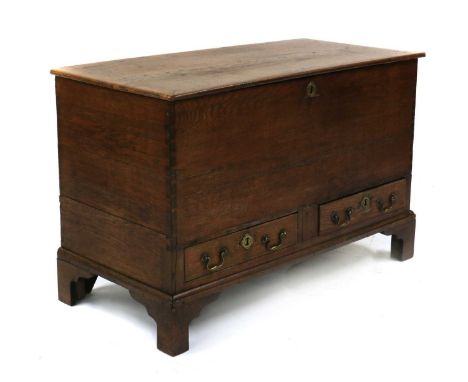 An oak dower chest,19th century, with two drawers and bracket feet,115cm wide54cm deep73cm highCondition report: Replaced hin