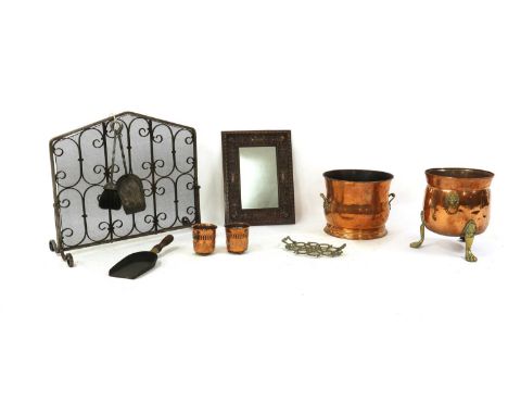 An Arts and Crafts bronzed mirror, the rectangular plate with stylised relief decorated frame, 43.5cm x 32.5cm, a pair of Art