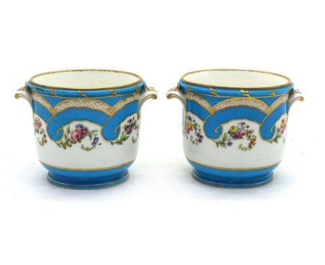 A pair of Sèvres bleu celeste porcelain coolers or seau a verre,dated 1789, painted by Jean-Joseph-Philippe Boucot, later dec