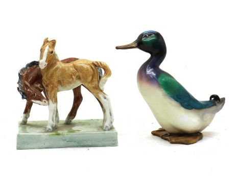 A Royal Worcester 'Foals' by Doris Lindner, printed and painted marks, 13.5cm hightogether with a Royal Doulton figure of a d