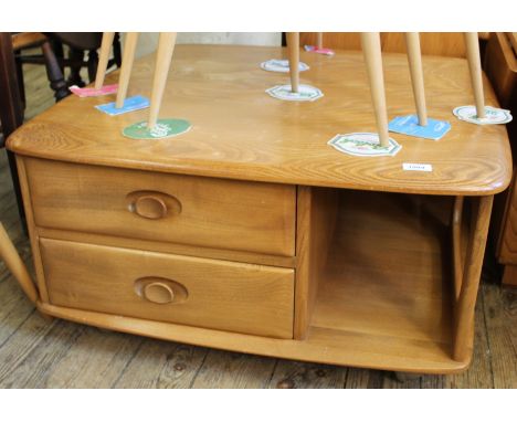 A 1970's light Ercol square coffee table/storage unit