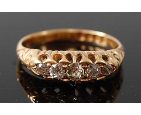 A late Victorian 18ct yellow gold diamond five-stone half hoop eternity ring, featuring five graduated Old European cut diamo