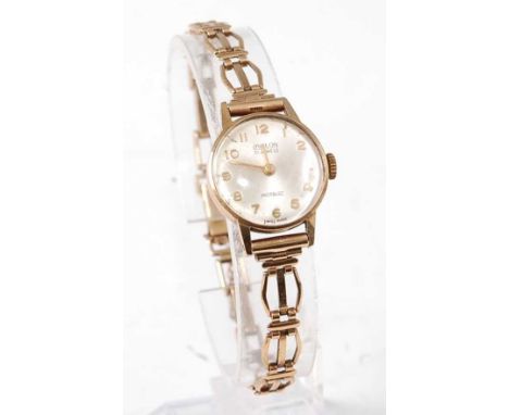 A lady's Avalon 9ct gold cased wristwatch, having signed silvered dial, manual wind Incabloc 21-jewel movement, dia.20mm, bac