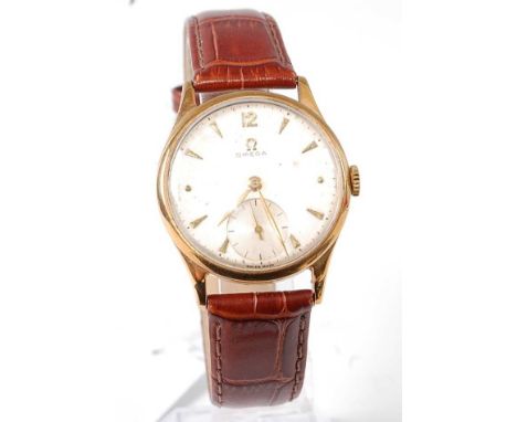 An Omega gent's 9ct gold cased wristwatch, having signed silvered dial with baton markers, subsidiary seconds dial, manual wi