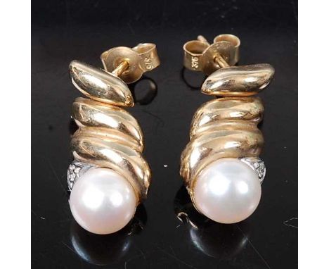 A pair of 9ct yellow gold, pearl and diamond articulated drop earrings, each with a 6.7mm cultured pearl suspended below thre