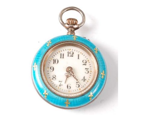 A white metal lady's manual wind fob watch with 26mm case in turquoise coloured guilloche enamel with fleur de lys detail and