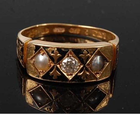 A late Victorian 18ct yellow gold, pearl and diamond memorial ring, featuring a centre rectangular panel inlaid with black en