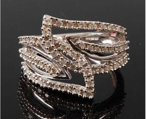 A 9ct white gold diamond three row crossover style ring comprising 52 melee cut diamonds in claw settings. Diamond diameters:
