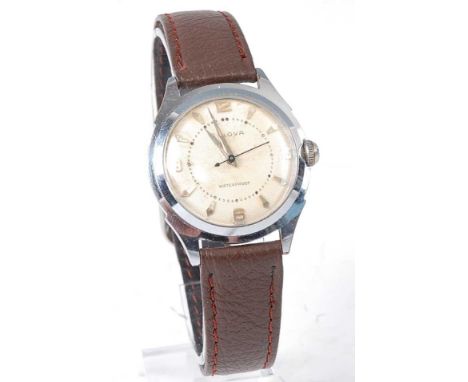 A vintage Bulova gent's steel cased wrist watch having a signed champagne dial with quarter Arabic numerals, manual wind, ant