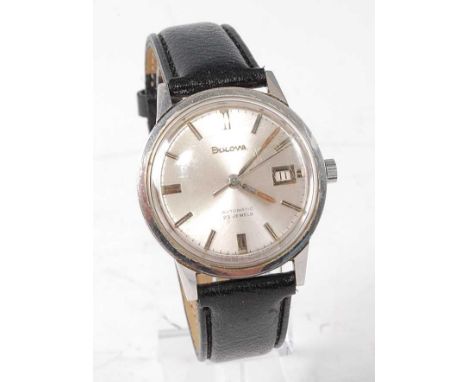 A Bulova gent's steel cased automatic wrist watch having signed silver dial with baton markers, date aperture, 23 jewel movem