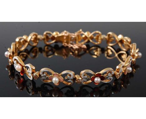 A yellow metal, pearl and diamond bracelet, featuring ten floral and scrollwork links in white, red and pink enamel, each set