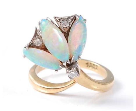 A yellow and white metal, opal and diamond fan shaped dress ring, featuring three marquise shaped opal cabochons interspersed