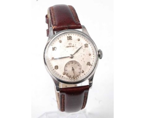 A vintage gent's Omega steel cased wristwatch, having a signed silvered dial with even Arabic numerals, subsidiary seconds di